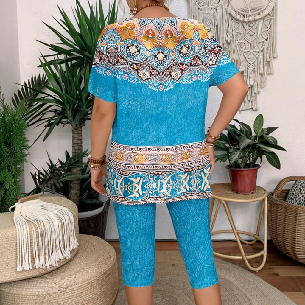 Conjunto Ibravacr de dos piezas azul turquesa con estampado étnico, blusa holgada y pantalones capri cómodos.