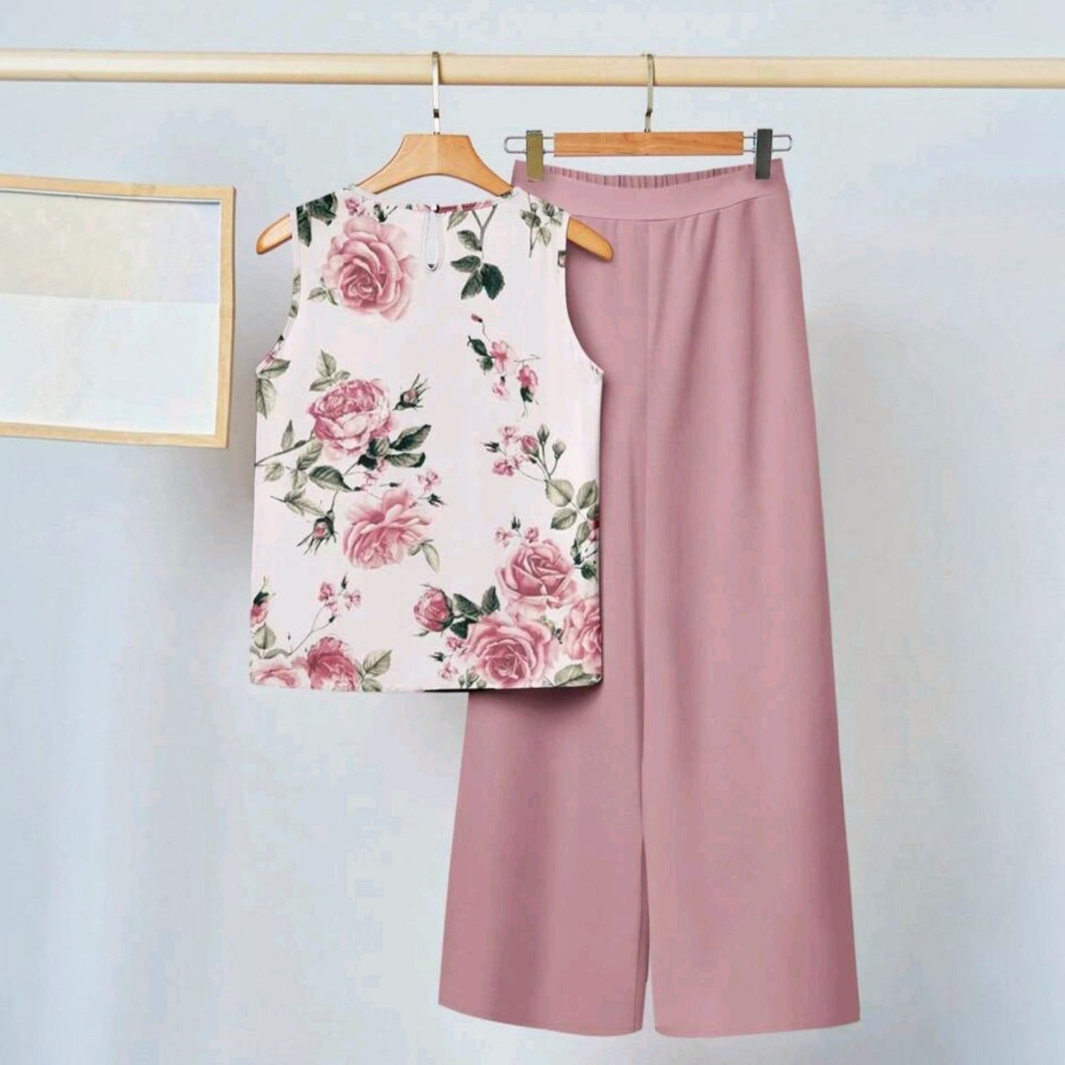 Conjunto Ibravacr de dos piezas con blusa sin mangas de estampado floral rosa y pantalones anchos de color rosa sólido