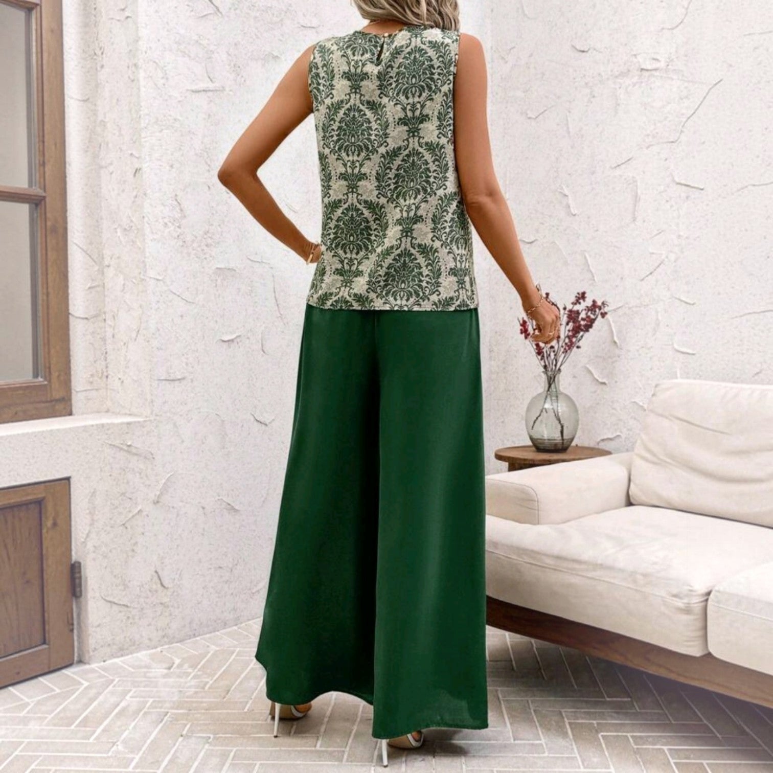 Conjunto Ibravacr de dos piezas con blusa sin mangas de estampado botánico y pantalones verde bosque de pierna ancha