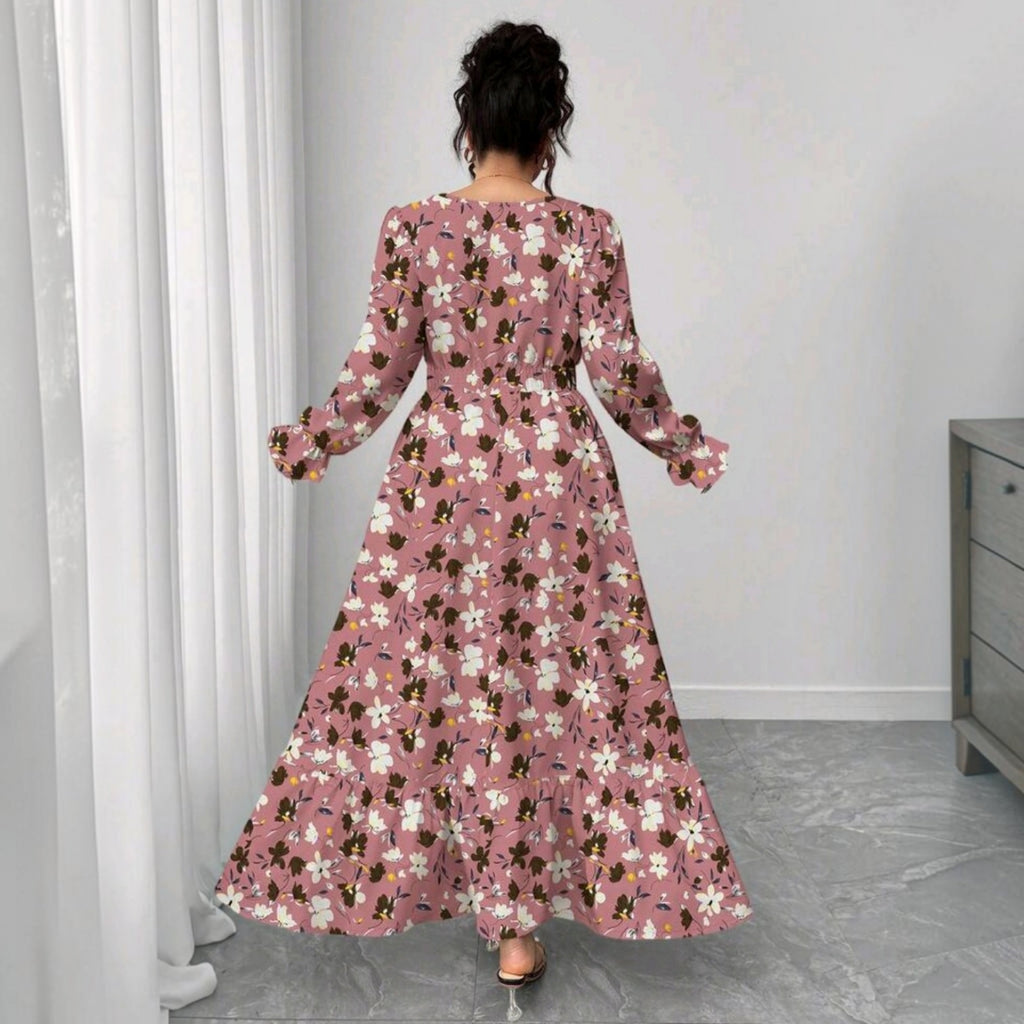 Vista trasera de un vestido largo Ibravacr rosa con estampado floral, mangas largas y falda con volante en el bajo.